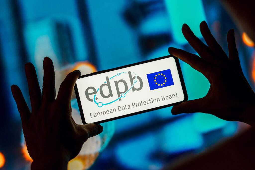 Photo of European Data Protection Board (EDPB) logo is displayed on a smartphone screen.